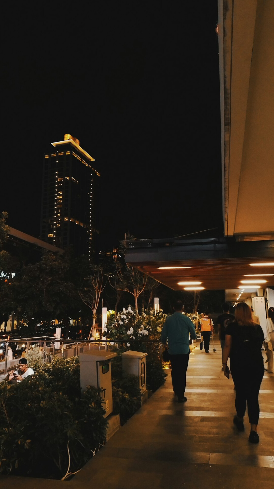 security guard patrolling mall at night